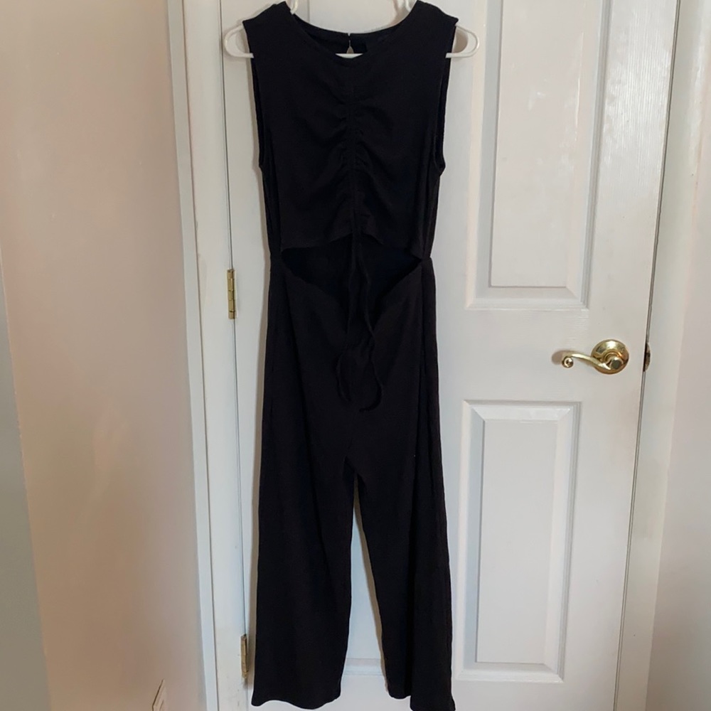 Kittenish black jumpsuit ribbed knit fabric